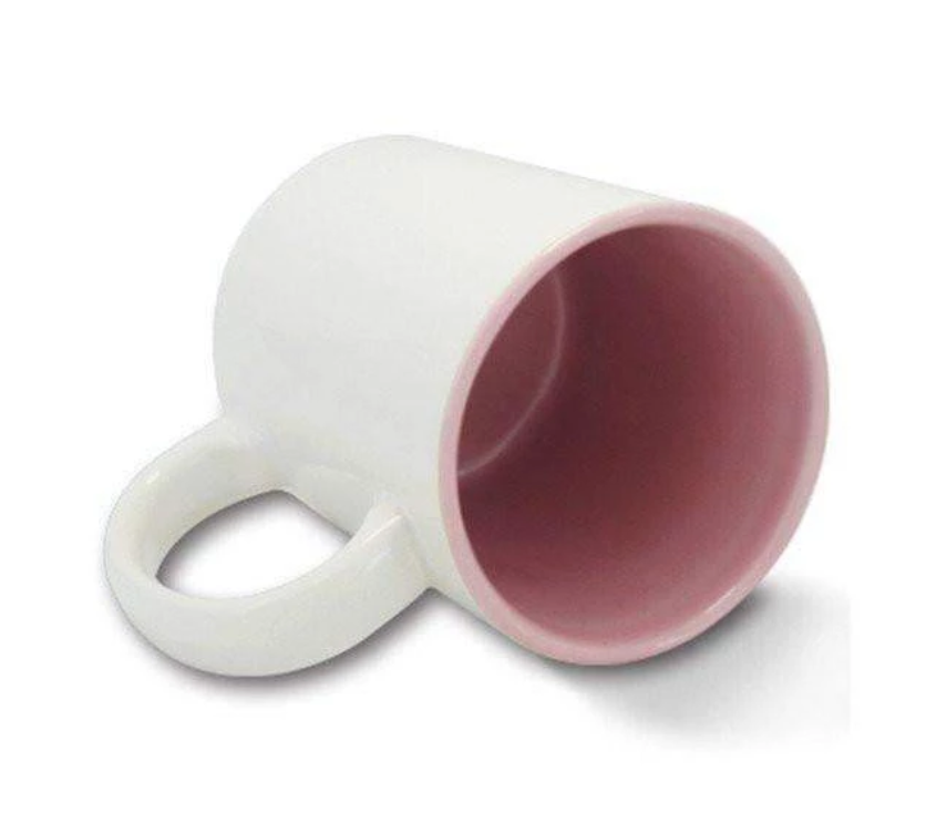 white and pink mug